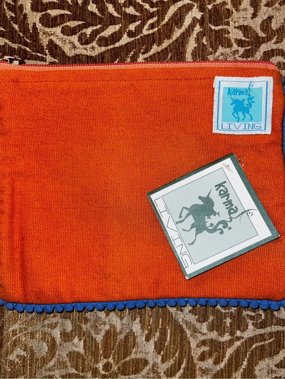 Karma Bright Orange Zip Pouch with Blue Trim